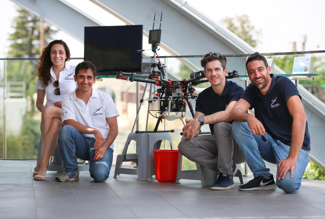 Colleagues from the Cyprus Institute show off their drones